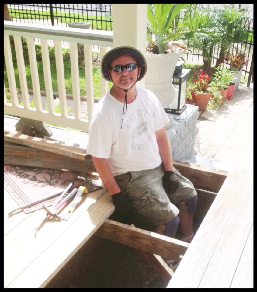 Owner (Ron) working on front porch during refurbishment project